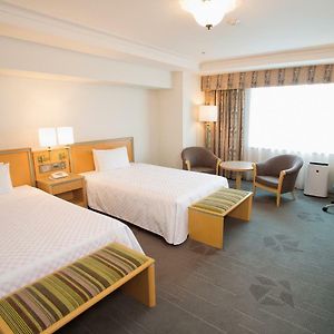 Deluxe Eck-Zimmer mit zwei Einzelbetten
